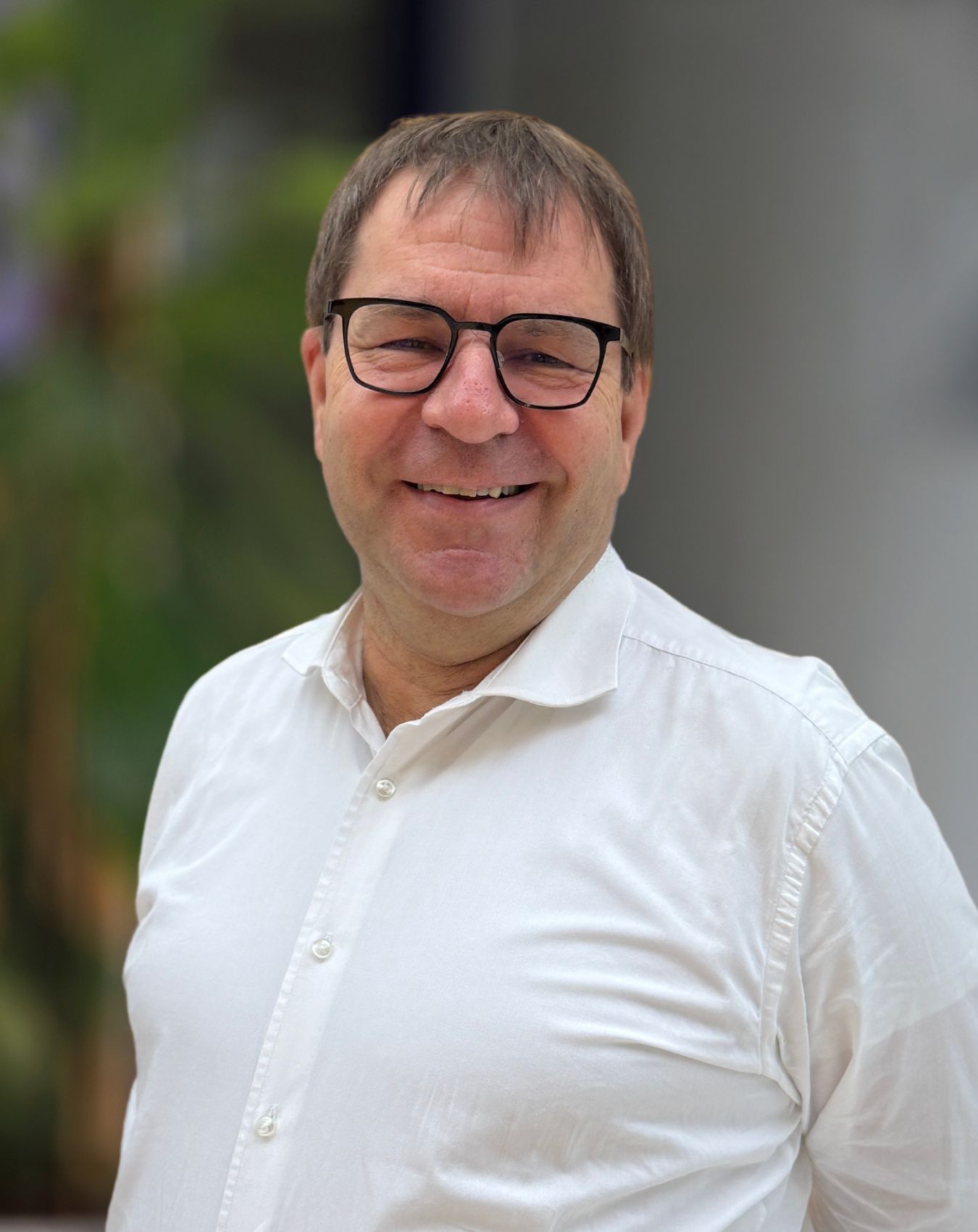 a man wearing glasses