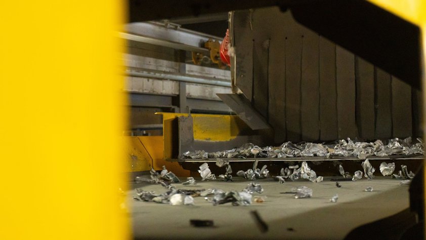 a dumpster with trash in it