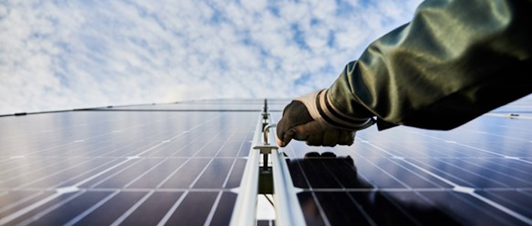 Aluminium‑framed solar panel mounting system on rooftop