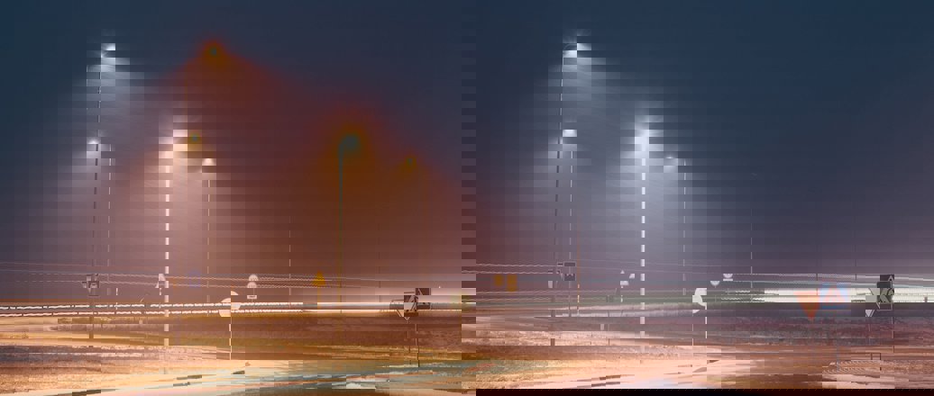 road lights, foggy evening in winter