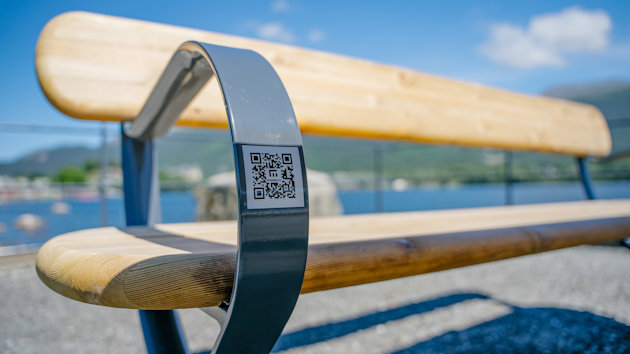 A bench with a QR code on it
