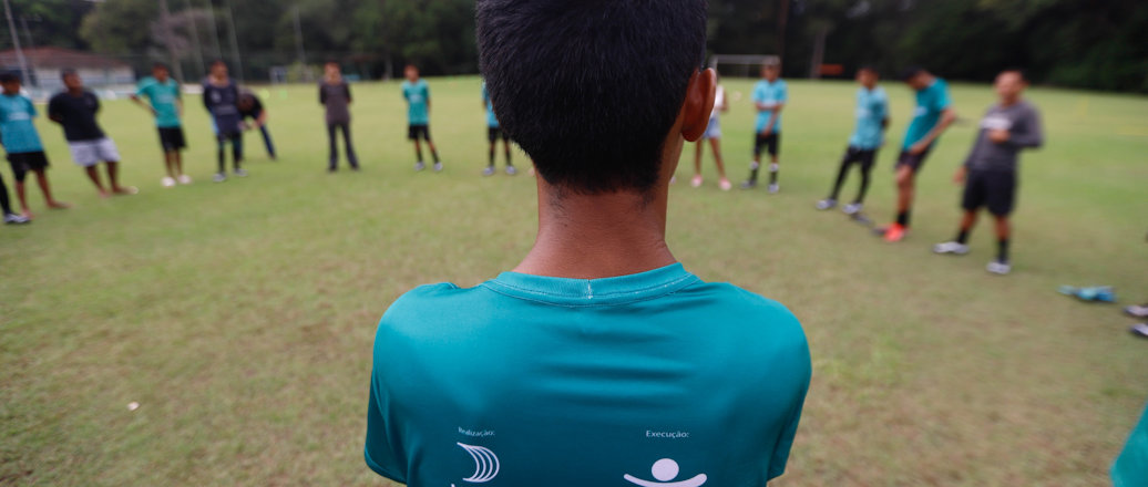 a group of people playing football