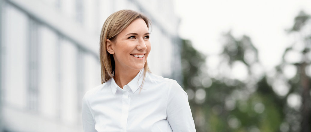 a person smiling outside