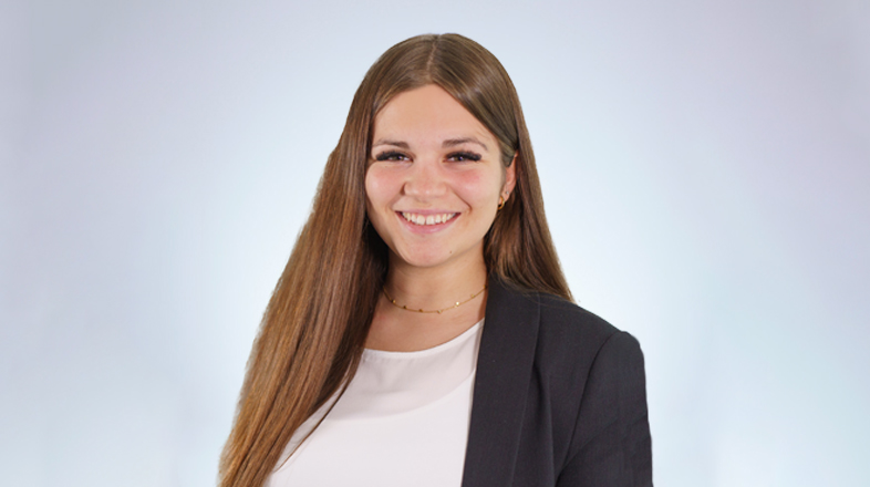 a woman smiling at camera