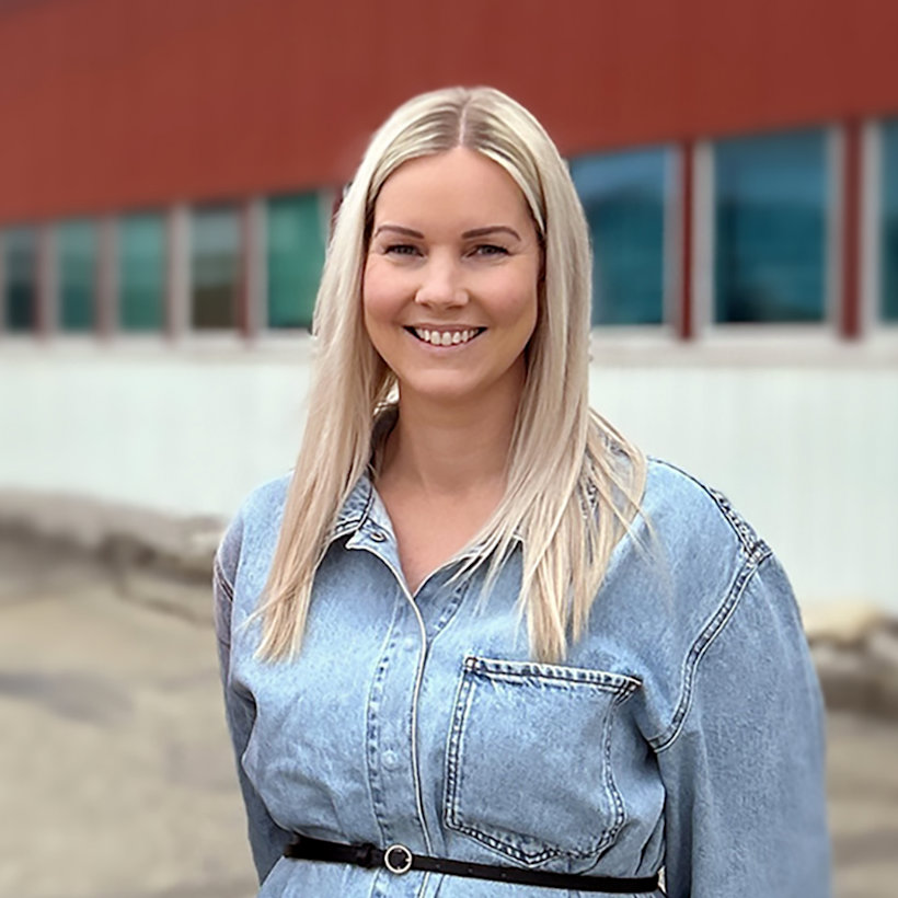 a woman smiling for the camera