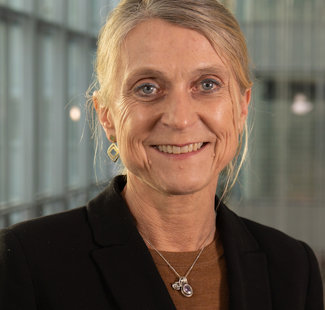 a close-up of a woman smiling