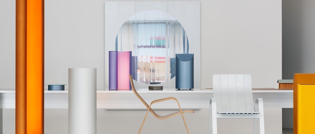 a table with chairs and a glass display