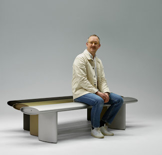 a man sitting on a bench