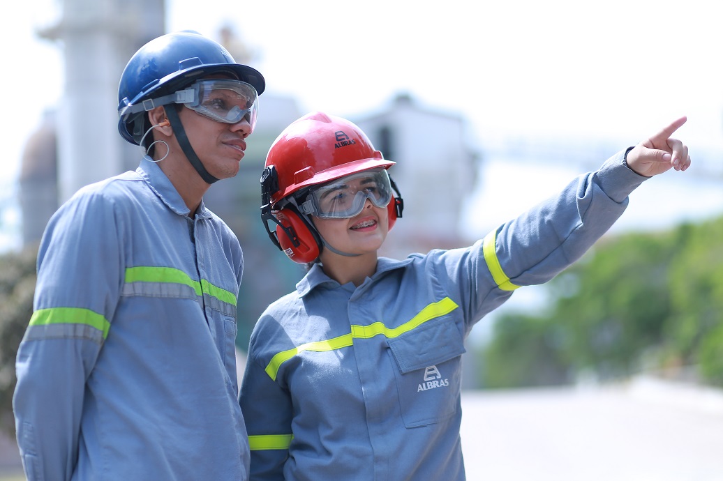 a couple of men wearing helmets and goggles