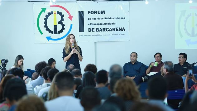Woman talking to a group of people