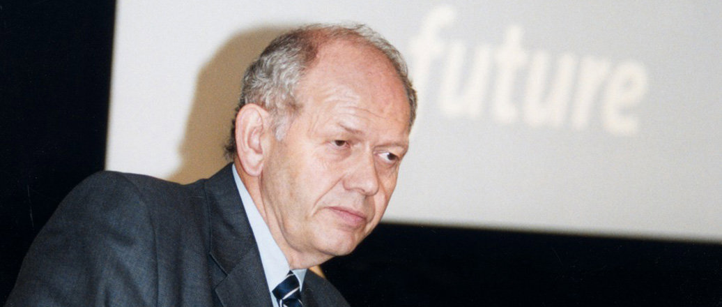 Egil Myklebust in front of a slide with the word future visible