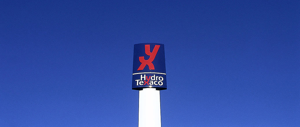 A sign with the Hydro Texaco common logo