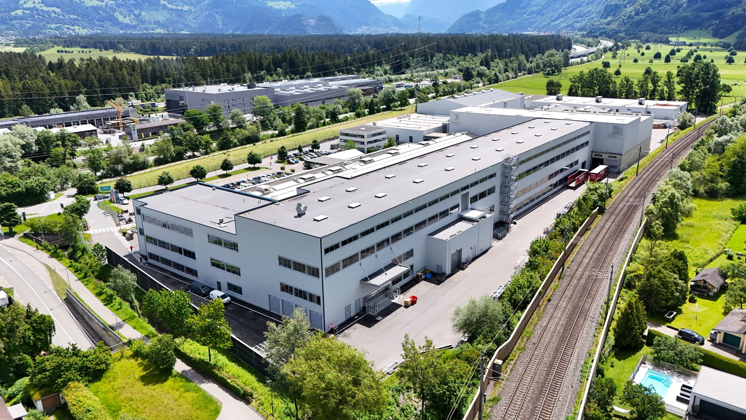 a large building with a parking lot