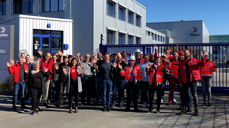 a group of people posing for a photo