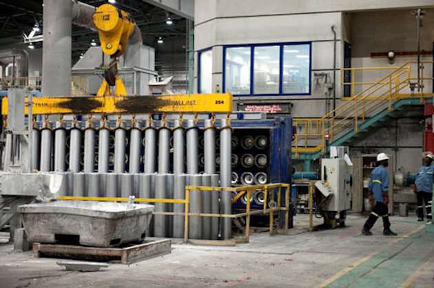 a person walking next to a machine