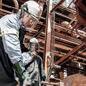 men wearing hard hats and protective gear men wearing hard hats and protective gear