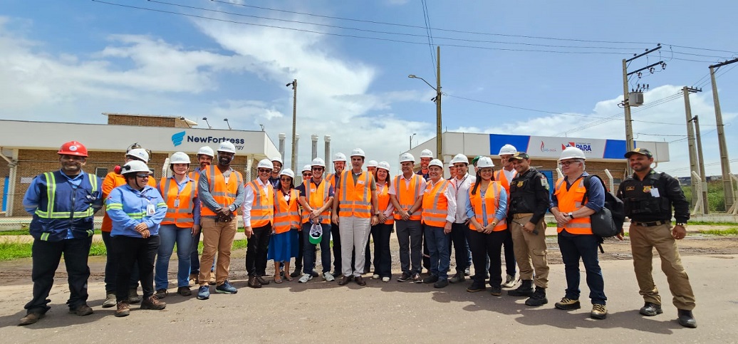a group of people wearing safety vests