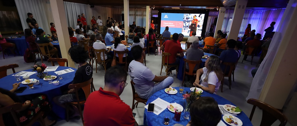 a group of people sitting at tables