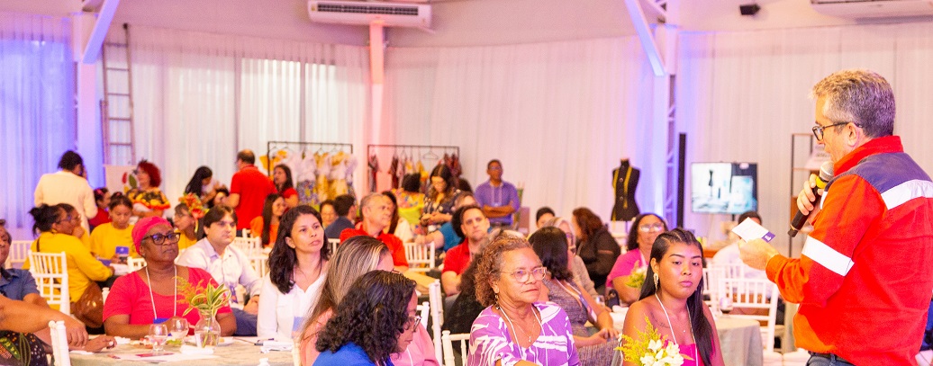 a person addressing a group of people