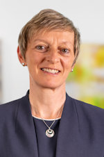 a close-up of a man smiling