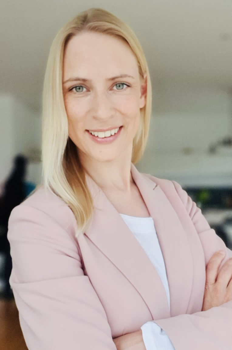 a woman smiling at the camera