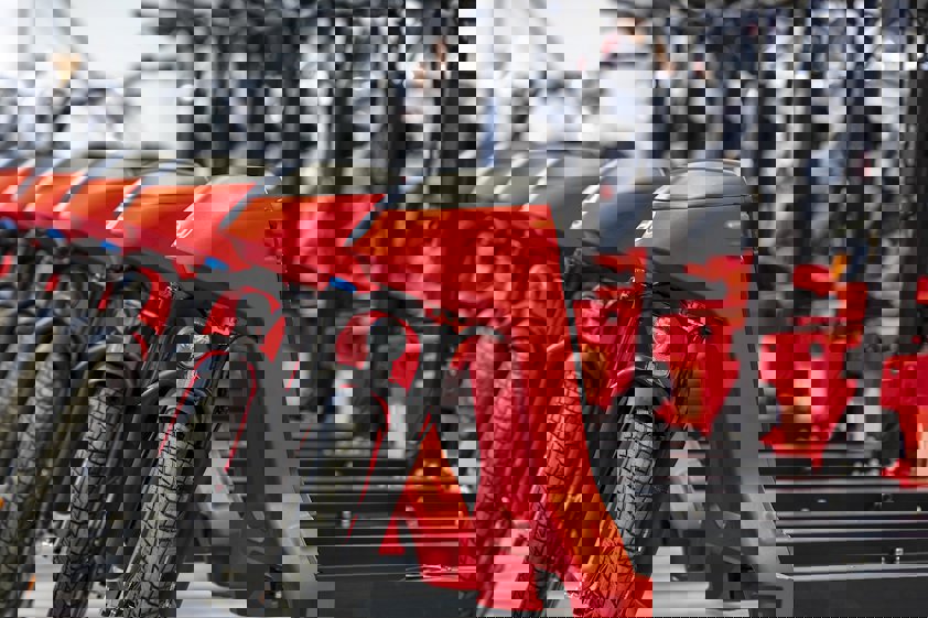 a red motorcycle with a black seat